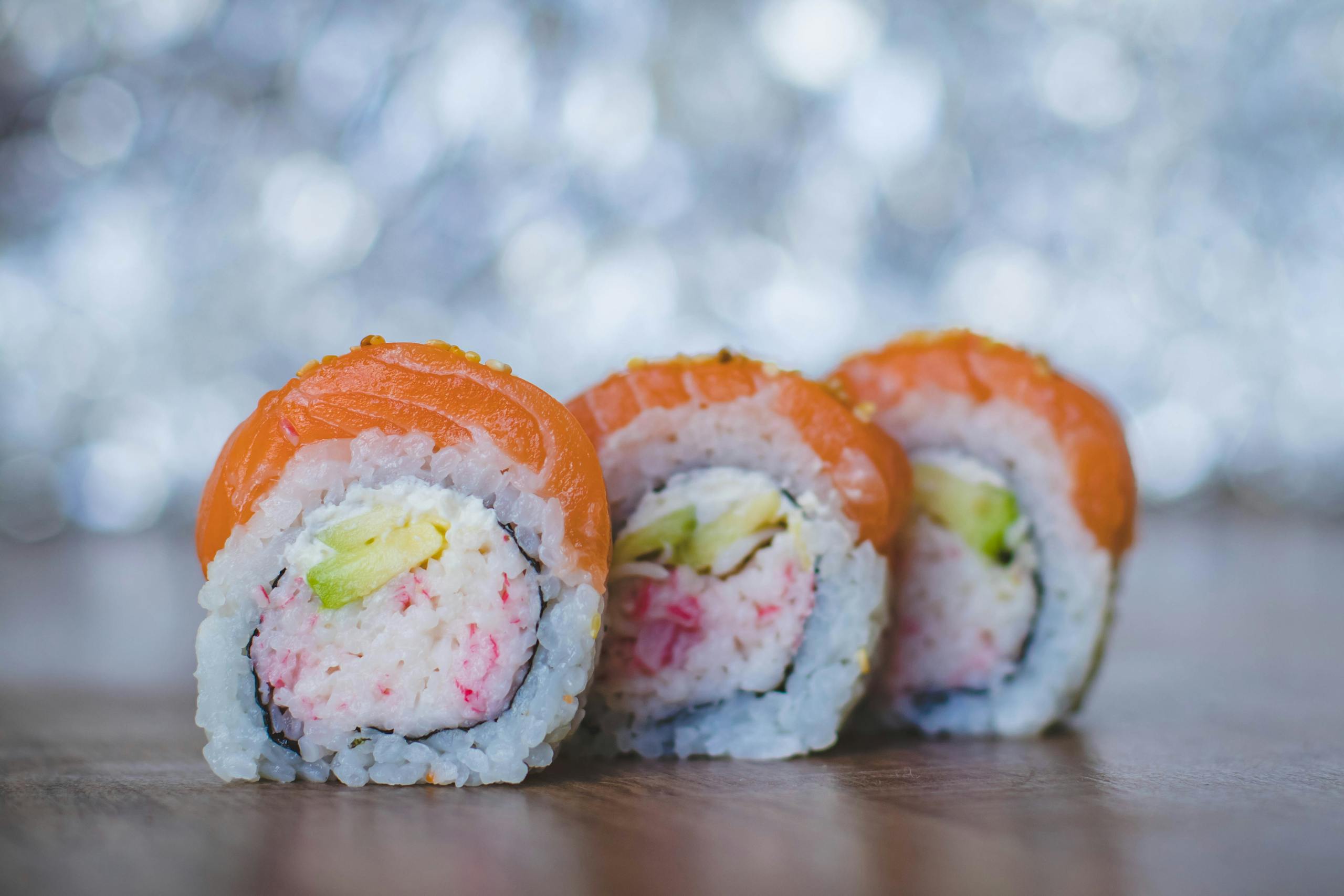 Delicious salmon sushi rolls with a vibrant and fresh look, perfect for food enthusiasts.